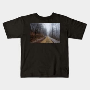 Foggy road in the forest Kids T-Shirt